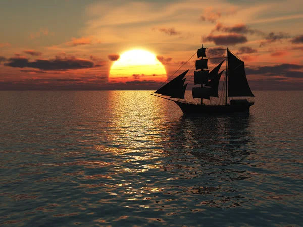 Корабль в море на закате — стоковое фото