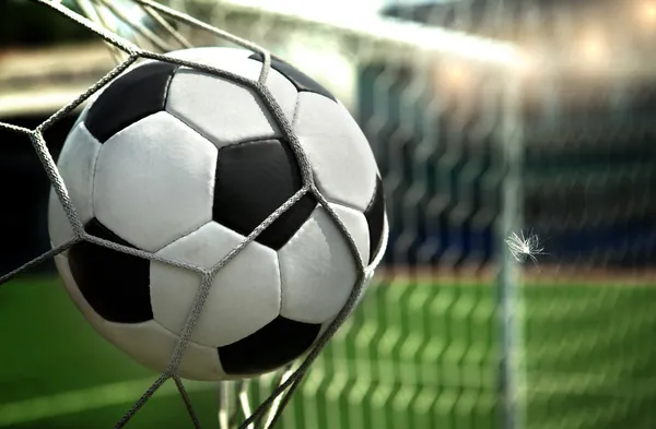 Футбол. Мяч летит в сетку ворот Стоковая Картинка
