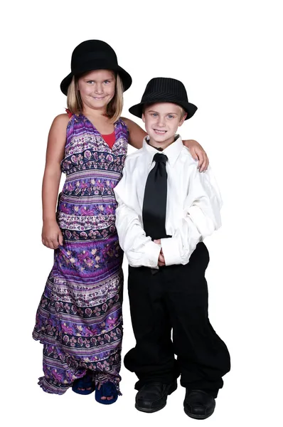 Мальчик и девочка в Негабаритные одежду — стоковое фото