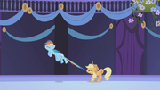 Applejack restrains Rainbow Dash S01E02